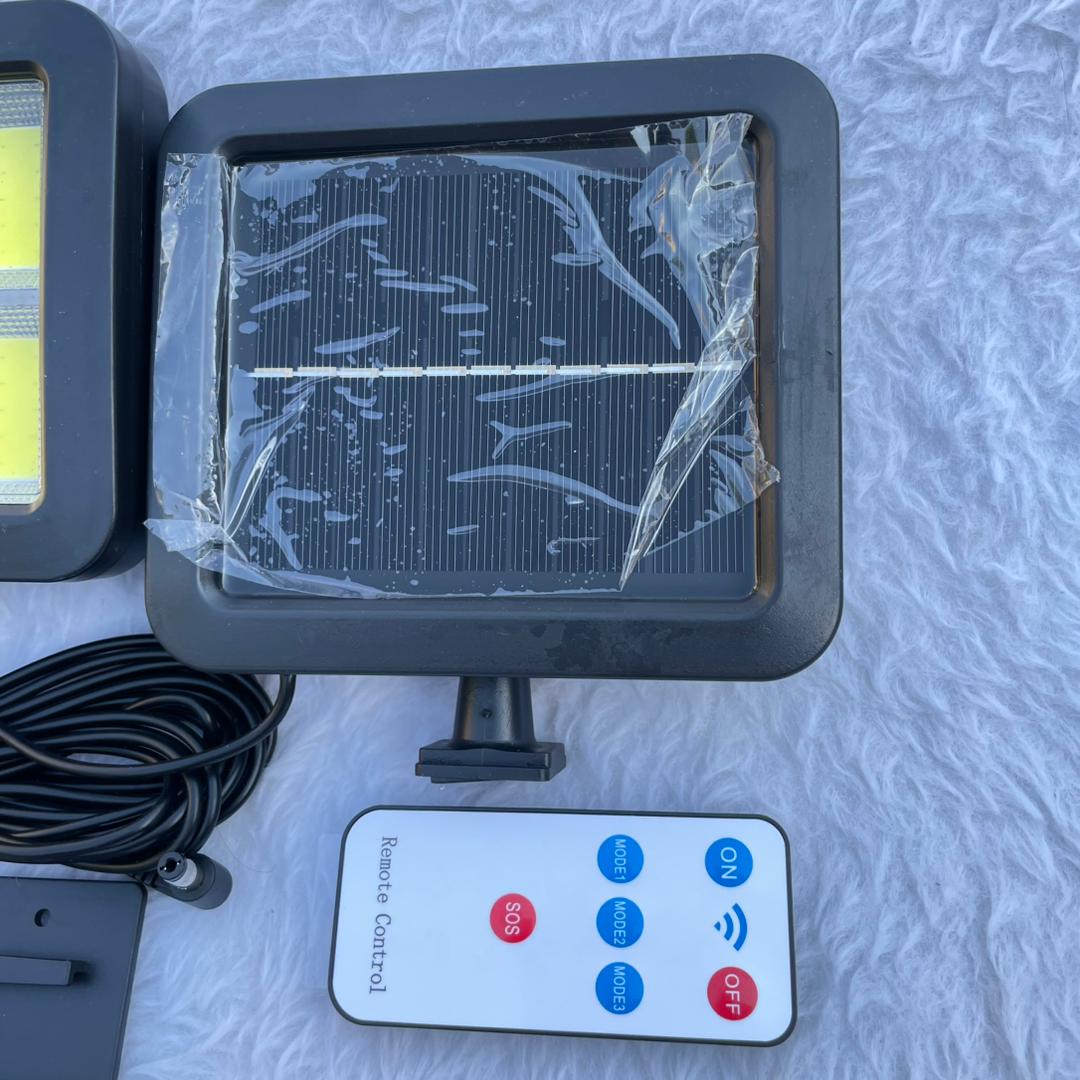 خرید چراغ خورشیدی دیواری پنل جدا COB سنسور دار 800 لومن ضدآب قابل تنظیم 360 درجه