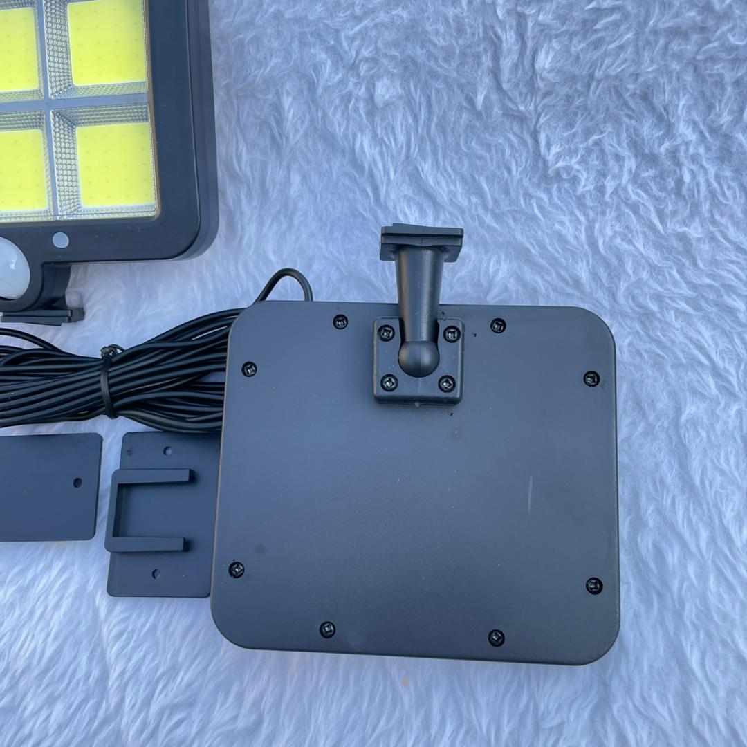 خرید چراغ خورشیدی دیواری پنل جدا COB سنسور دار 800 لومن ضدآب قابل تنظیم 360 درجه