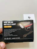 خرید چراغ جلو دوچرخه NB مدل HY-7599 با شارژ USB و خورشیدی و بوق داخلی
