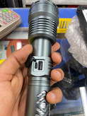 خرید چراغقوه 360 KF‑1066 | شارژی، لیزر 20 وات، برد 2000 متر، باتری 8000mAh و پاوربانک