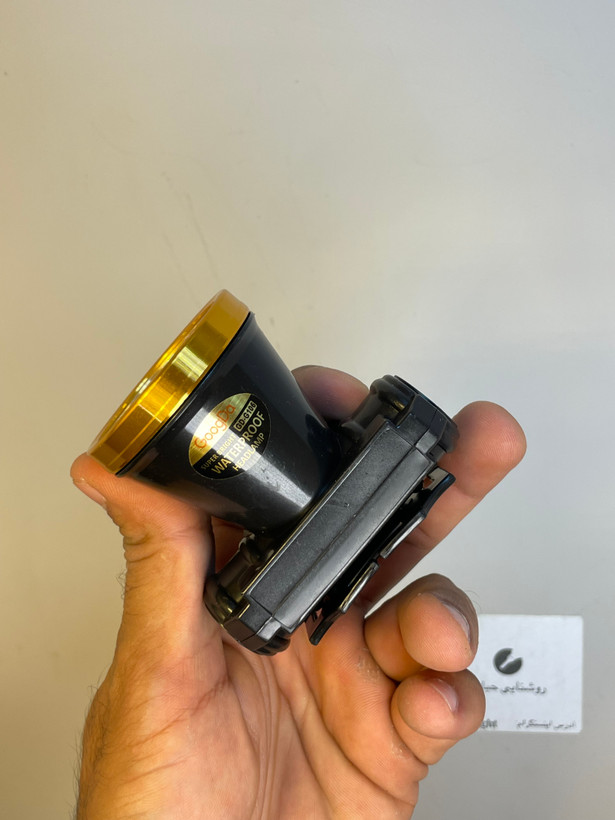 هدلایت ضدآب GD‑G106 دوحالته نور سفید و زرد + کش سر بند