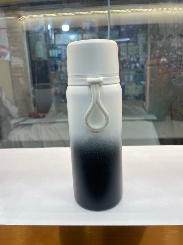 فلاسک استیل دوجداره یوایلی (UYLEE) با دسته حمل و درب دوگانه (لیوانی و توری اسپریچ)